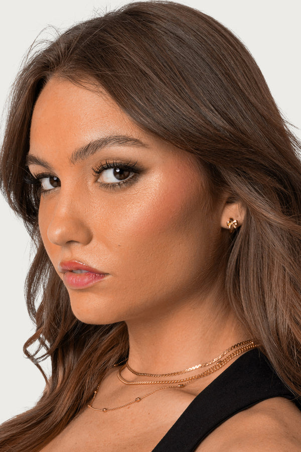 Bow Huggy Hoop Earrings view 2
