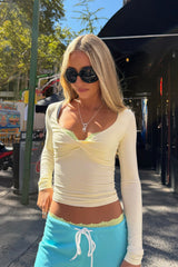 Manka Twisted Long Sleeve Top
